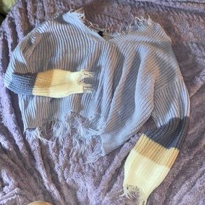 Soft distressed style knit sweater